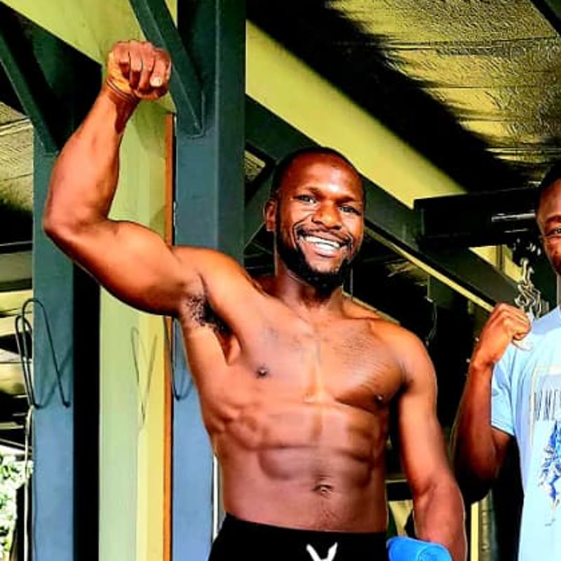 Tim laughing with his fist in the air after a session